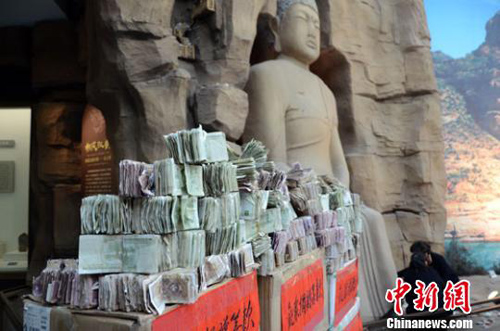 「佛教」甘肃省博集游客5万元零散“善款”保护北石窟寺 「佛教」甘肃省博集游客5万元零散“善款”保护北石窟寺